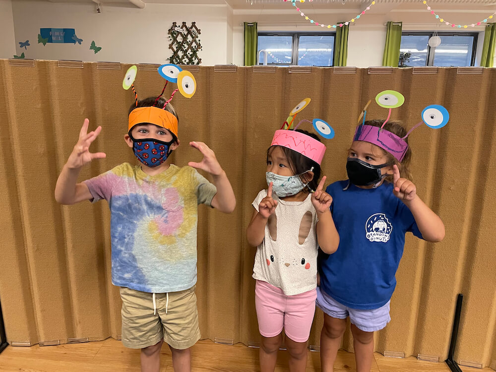 kids playing in space themed theater summer camp